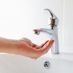 Hand,Under,Faucet,With,Low,Pressure,Water,Stream