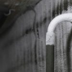 Frozen,Plumbing,With,A,Thick,Layer,Of,White,Frost,In